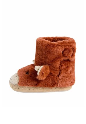 Brun fluffig toffel med rund tå, mjuk pälsutsida, broderade ansiktsdetaljer och en beige sula med dekorativ sömnad.