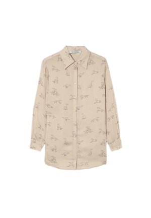 Camisa de botón de manga larga beige con ilustraciones de perros en líneas finas por toda la superficie y cuello clásico con puntas.