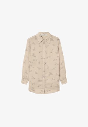 Camisa de botón de manga larga beige con ilustraciones de perros en líneas finas por toda la superficie y cuello clásico con puntas.