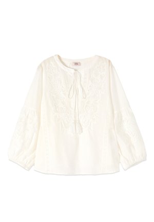 Biała bluzka z długim rękawem z kwiatowym haftem, wiązaniem z frędzlami przy okrągłym dekolcie oraz elastycznymi mankietami.