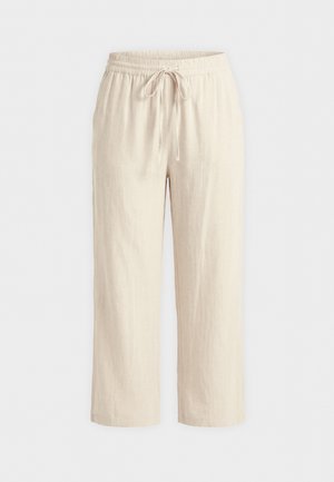 Bež široke hlače z elastičnim pasom in sprednjo vrvico, izdelane iz lahkega blaga, prikazane na belem ozadju.