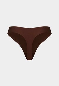 Brown naadloze stringonderbroek gepresenteerd op een effen lichtgrijze achtergrond.