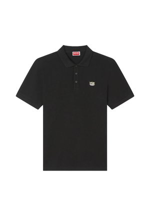 Polo noir à manches courtes avec trois boutons et petit logo tigre brodé sur la poitrine gauche.