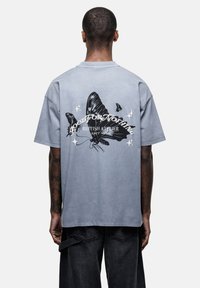 LIBERTY FADED  TEE - T-Shirt print - light blue