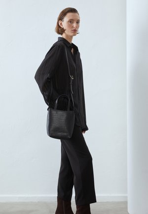 LEATHER - Handbag - black