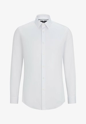 Biela košeľa s dlhým rukávom vyrobená z hladkej tkaniny, s gombíkovou prednou časťou, klasickým golierom a zaobleným lemom so zapínaním na gombičky.