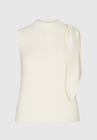 Haut sans manches en maille crème avec col montant et grand nœud en tissu sur l'épaule droite.