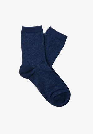 Navy blue socks with a shimmering texture, featuring a solid design and ribbed cuffs. Material gives a subtle sheen.