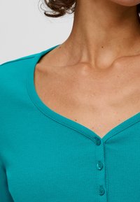 s.Oliver MIT KNOPFLEISTE - Longsleeve - türkis