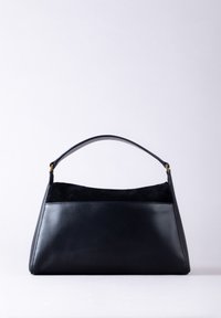 Black leather handbag with suede upper panel and short handle, displayed against plain light background.