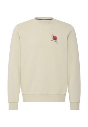 Kreemikas ümarkaelusega dressipluus, millel vasakul rinnal väike must kraanulind ja punase päikesega kujundus.