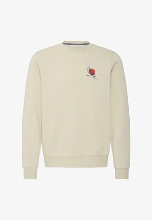 Kreemikas ümarkaelusega dressipluus, millel vasakul rinnal väike must kraanulind ja punase päikesega kujundus.