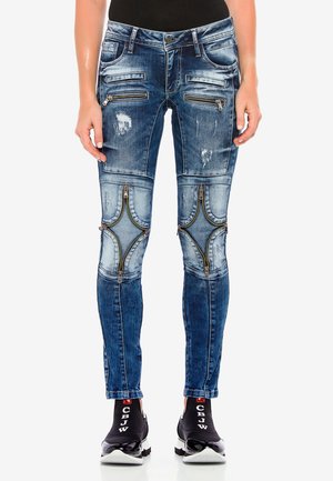 MIT COOLER WASCHUNG UND ZIERNÄHTEN - Slim fit jeans - blue