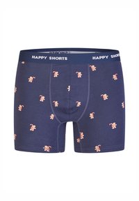Boxer azul marino con textura suave, con un patrón repetido de hombres de jengibre y bastones de caramelo. Cintura elástica con el texto "HAPPY SHORTS".