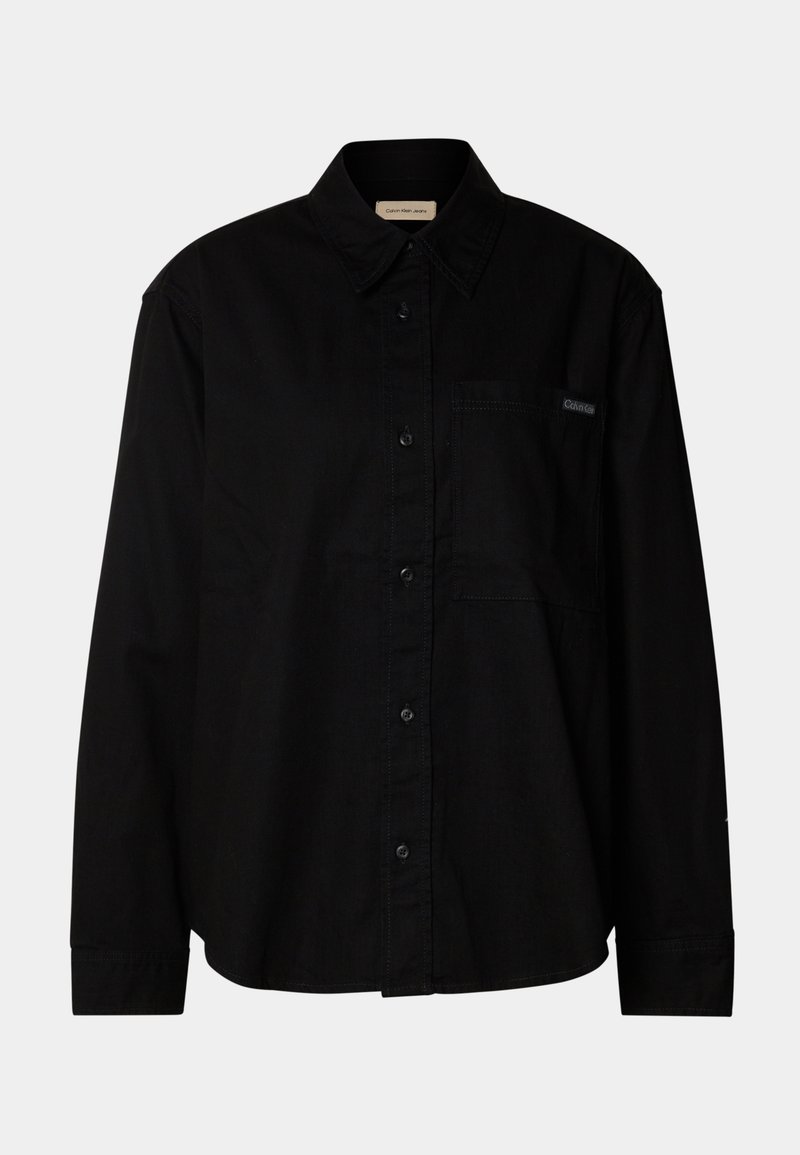 Black long-sleeve button-up shirt with collar, front pocket, and Calvin Klein logo on the chest pocket.