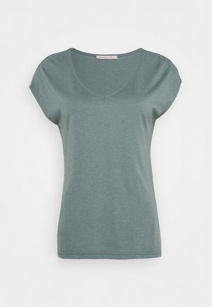 Green short-sleeve t-shirt made of soft fabric. Features a v-neck design and a relaxed fit with a smooth texture.