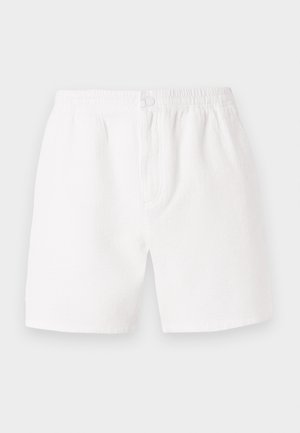 Shorts blancos con textura, tienen una cintura elástica y cierre de botón. Presentan un corte holgado y llegan a la mitad del muslo, ideales para uso casual.