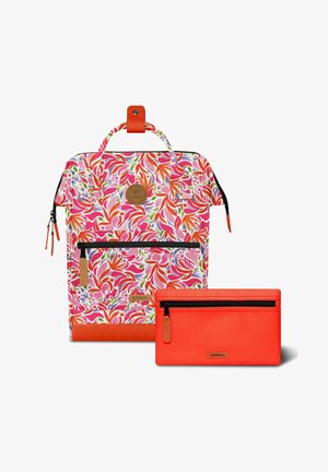 Colorful floral-patterned backpack with orange leather bottom and matching orange zippered pouch with front pockets and branded leather tags.