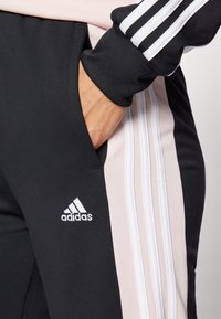 adidas Sportswear BOLDBLOCK TRACKSUIT - Tuta - black/sandy pink