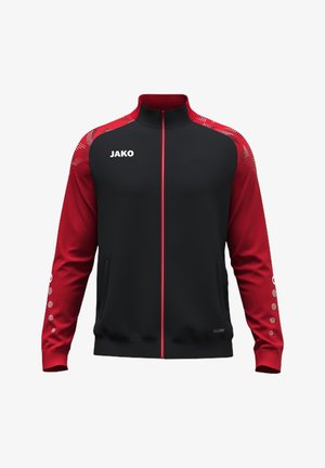 Trainingsjacke mit schwarzer Vorderseite und Rumpf, roten Ärmeln mit Punktmustern, rotem Reißverschluss, hohem Kragen und weißem „JAKO“-Logo auf der Brust.