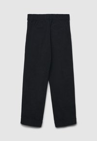 Schwarze High-Waist-Cordhosen mit elastischem Bund, zwei geschnittenen Taschen hinten und umgeschlagenen Säumen auf einem hellgrauen Hintergrund.