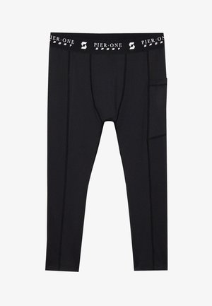 Leggings atléticos pretos com um tecido elástico. Apresentam uma cinta larga com a marca "PIER ONE SPORT" e um bolso lateral.