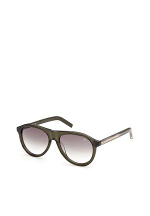 Round, semi-transparent olive green sunglasses with gradient gray lenses and thin, straight temples against a white background.