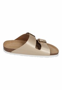 Beige leather slide sandal with two adjustable buckles, cork footbed, and white rubber sole. Features an open design for breathability.