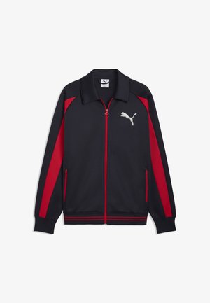 Czarna kurtka sportowa na zamek błyskawiczny z czerwonymi paskami na rękawach i zamkach, ściągaczami na mankietach i dole oraz białym logo Puma na lewej piersi.