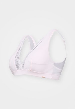 Sujetador de un suave rosa pálido con detalles de encaje y tejido blando. Presenta un diseño de escote en V y tirantes anchos para mayor soporte. Estructura ligera y sin costuras.