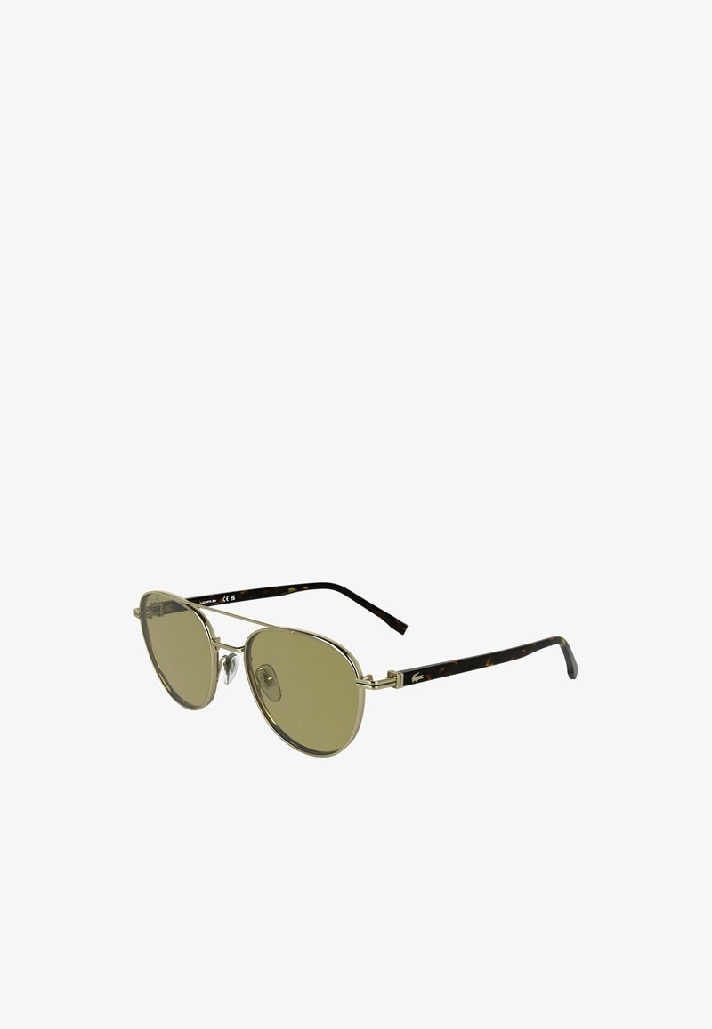 Okulary przeciwsłoneczne w odcieniu brązu, o owalnym kształcie, z metalową oprawą i ramionami w deseń żółwia. Regulowane noski dla wygody.