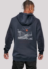 Navy hoodie made of cotton blend, featuring a graphic print of a cityscape with a sun. Includes a drawstring hood and ribbed cuffs.