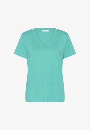 Turkusowa koszula z krótkim rękawem, dekoltem w kształcie litery V, gładkim wzorem oraz małą metką marki wewnątrz kołnierzyka.