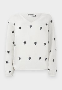 Maglione bianco con scollatura a V, caratterizzato da una texture morbida e da cuori neri in paillettes sparsi. Maniche lunghe e design comodo.