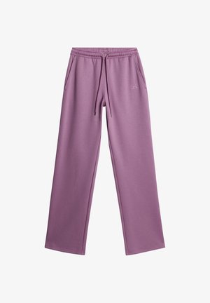 Fioletowe dresy wykonane z miękkiego materiału, z elastycznym pasem na sznurku, kieszeniami po bokach i luźnym krojem. Gładka faktura z subtelnym logo.