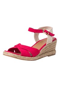 Rosa ruskind wedge sandal med krydset stropper og en naturlig jute-indpakket hæl. Spænde lukning ved anklen. Glat indvendig foring.