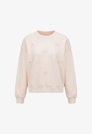 Lyserød sweatshirt med lange ærmer og små dekorative sløjfer jævnt fordelt på forsiden, ensfarvet baggrund.