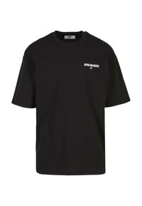 Black cotton T-shirt with short sleeves, round neck, and white text "ASPIRE AND ACHIEVE" on the left chest area. Simple, unadorned design.
