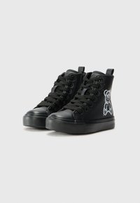 Black high-top sneakers made of smooth leather with black laces, featuring a white bear graphic on the side and a textured rubber sole.