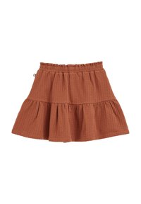 Jupe brune à volants en tissu texturé. Taille élastiquée. Présente un design superposé avec un motif subtil sur l'ensemble.