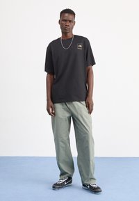 The North Face COORDINATES TEE - Print T-shirt - black