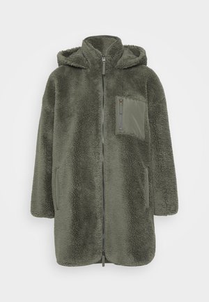 Fuzzy green fleece coat with a hood, front zip closure, and elastic side pockets. Features a zippered chest pocket. Soft texture.