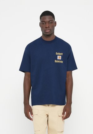 Navy blue cotton t-shirt with short sleeves, featuring gold text "Carhartt University" and a logo tag on the chest.
