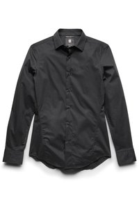 Camicia nera a maniche lunghe con bottoni, realizzata in tessuto morbido, dal taglio aderente, con colletto a punta e sette bottoni neri lungo la parte anteriore.