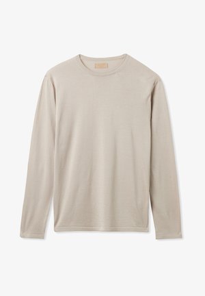 Koszula z długim rękawem w jasnobeżowym kolorze, wykonana z miękkiego materiału. Posiada okrągły dekolt i proste przeszycia wzdłuż brzegu i rękawów.