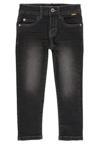 Tejanos de mezclilla negra con un corte ajustado, que presentan costuras en contraste, cinco bolsillos y un cierre de cremallera con botón. Tiro limpio.