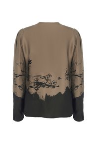 Blusa marrone realizzata in tessuto leggero, con stampa floreale nera lungo le maniche e un orlo più scuro. Vestibilità rilassata con maniche lunghe.