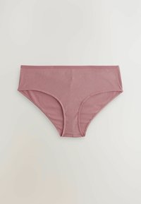 Lyserøde ribbede stoftrusser med en mellemlang skæring, der har en blød elastisk talje og en glat tekstur. Ingen yderligere mønstre eller detaljer.
