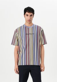 Striped short-sleeve t-shirt in pastel colors (yellow, blue, red, and black) with a crew neckline and embroidered text on the front.