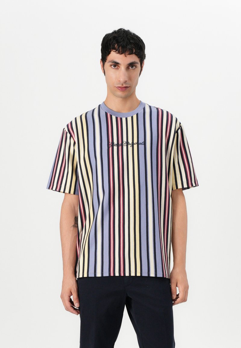 Striped short-sleeve t-shirt in pastel colors (yellow, blue, red, and black) with a crew neckline and embroidered text on the front.
